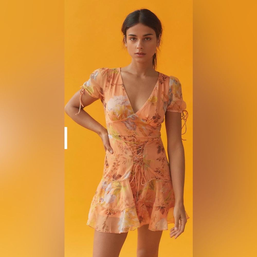 NWOT Urban Outfitters Kiss The Sky Orange Ruffled Puff Sleeve Mini Dress.